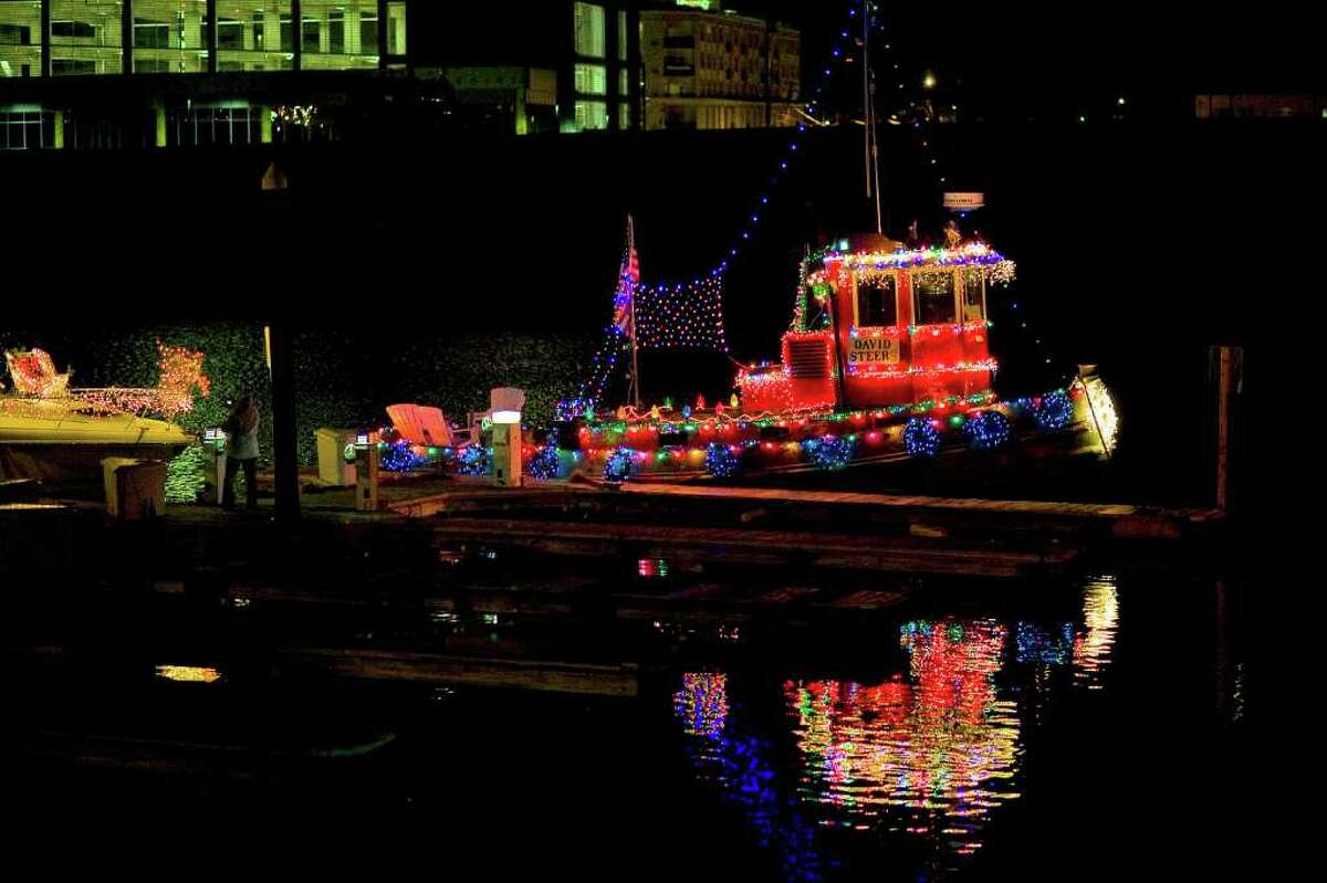 Parade of boats ushers in Christmas season