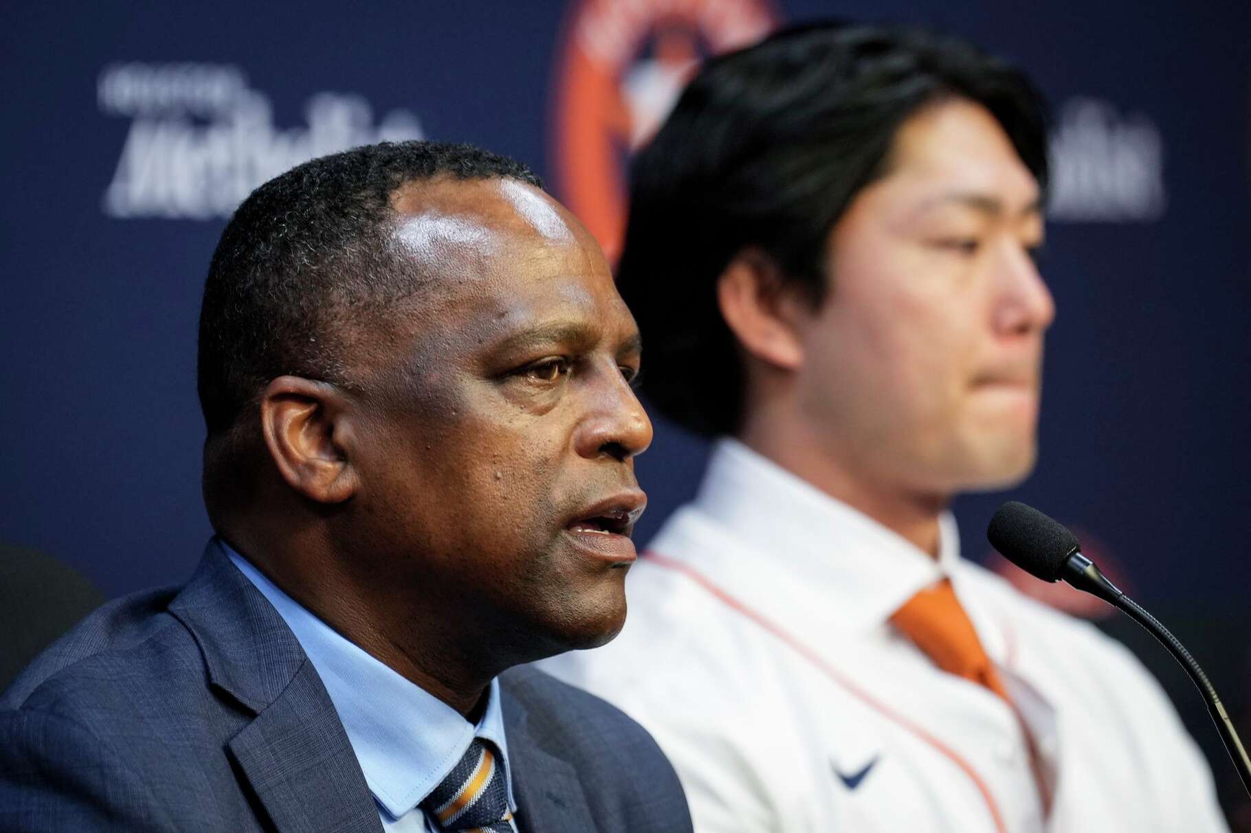 Houston Astros General Manager Dana Brown, left, talks about new pitcher Tatsuya Imai during a news conference introducing the Japanese pitcher at Daikin Park in Houston, Monday, Jan. 5, 2026. Imai, 27, was an All-Star last season with the Seibu Lions in the Nippon Professional Baseball Organization, where he went 10-5 with a 1.92 ERA (35ER/163.2IP) in 24 games. Among qualified pitchers, Imai posted the lowest WHIP (0.89) in the Pacific League, while ranking second with 178 strikeouts in his 163.2 innings pitched.