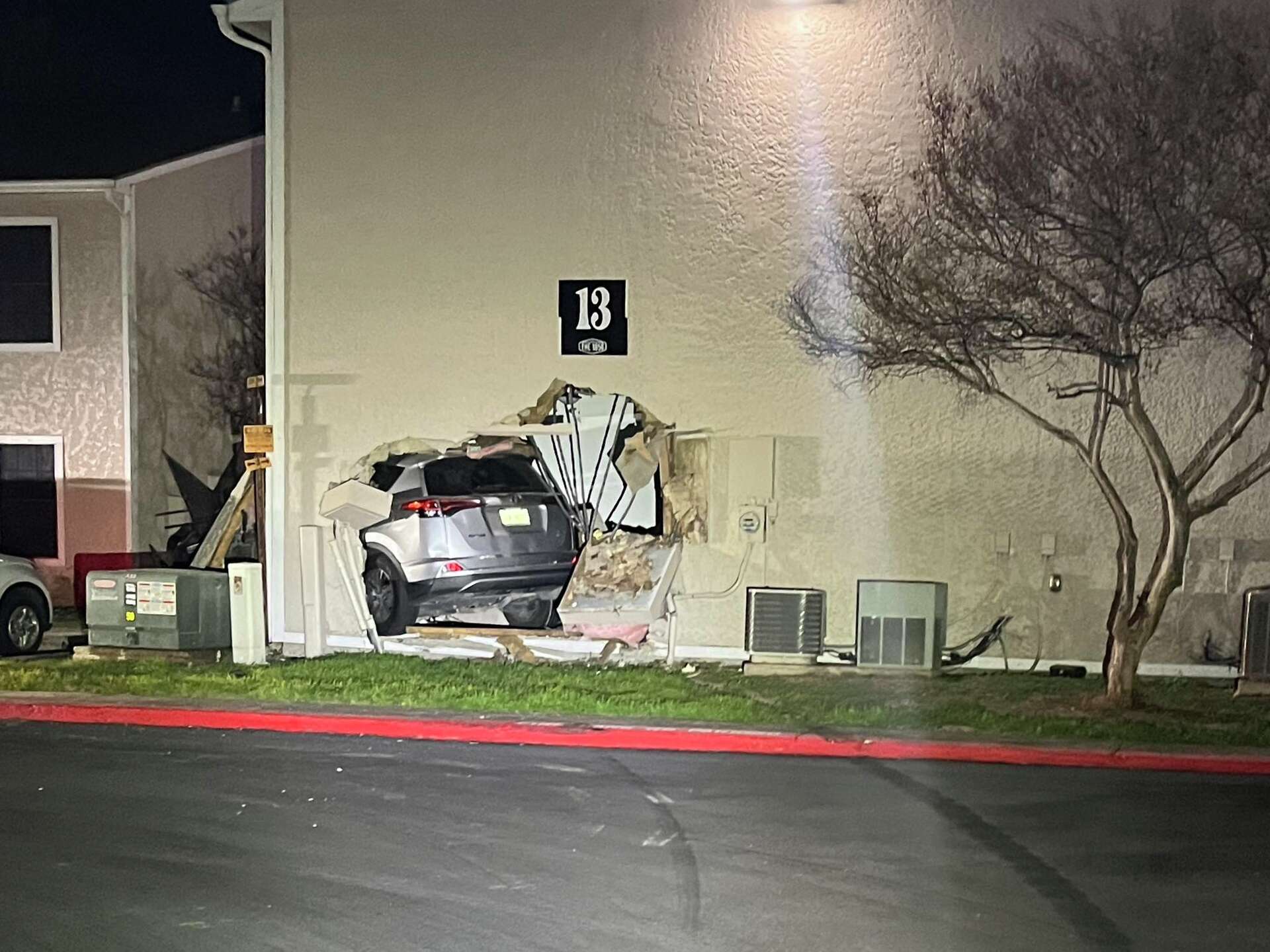 Car crashes into San Marcos apartment building, sparks viral police po