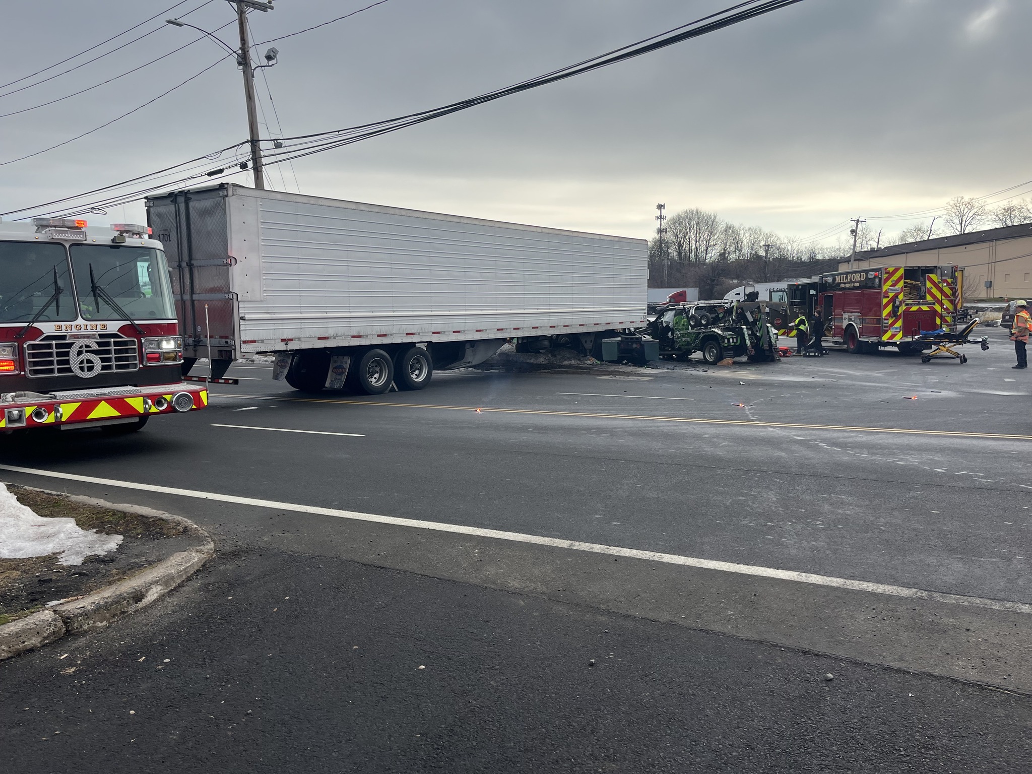Milford crash on Old Gate Lane spills 20 gallons of fluid: Officials