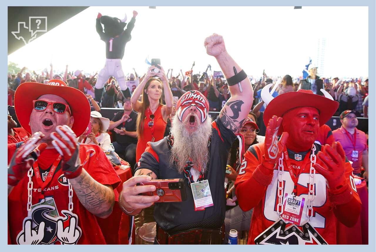 Steve Beckholt, center, reacts to the Texans' first round draft pick at a draft party at Miller Amphitheater in Houston on Thursday, April 28, 2022. Beckholt is perhaps better known as 'Ultimate Fan.'