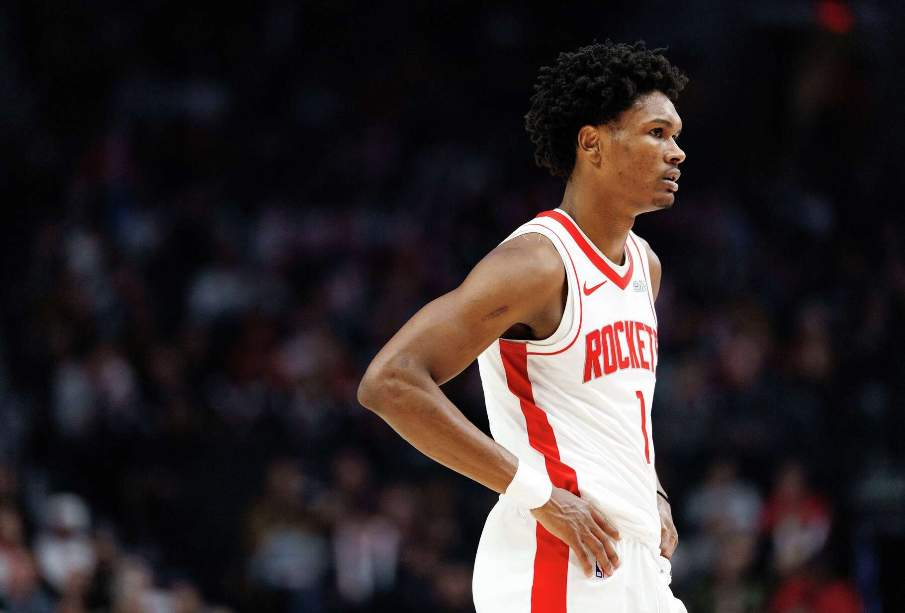 Houston Rockets guard Amen Thompson looks on during the first half of an NBA basketball game against the Portland Trail Blazers, Friday, Jan. 9, 2026, in Portland, Ore. (AP Photo/Howard Lao)