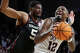 Texas A&M forward Rashaun Agee (12) drives against Oklahoma forward Mohamed Wague during the second half Jan. 10, 2026 at Reed Arena in College Station.