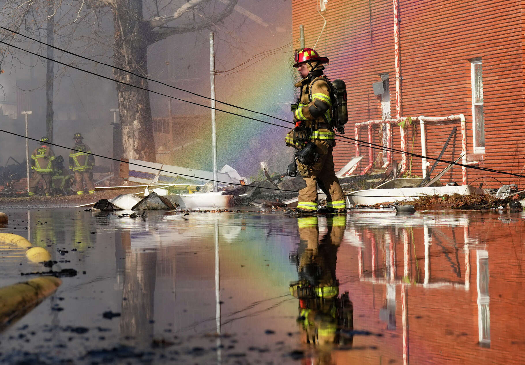 Houston Fire Department works on a three-alarm fire on off of North Freeway in Monday, Jan. 12, 2026.