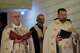 Portuguese Catholic priest and deejay Guilherme Peixoto, left, leads a Mass service ahead of his concert at the Holy Spirit University of Kaslik, Lebanon, Saturday, Jan. 10, 2026, after a Lebanese court rejected a petition to ban his concert.