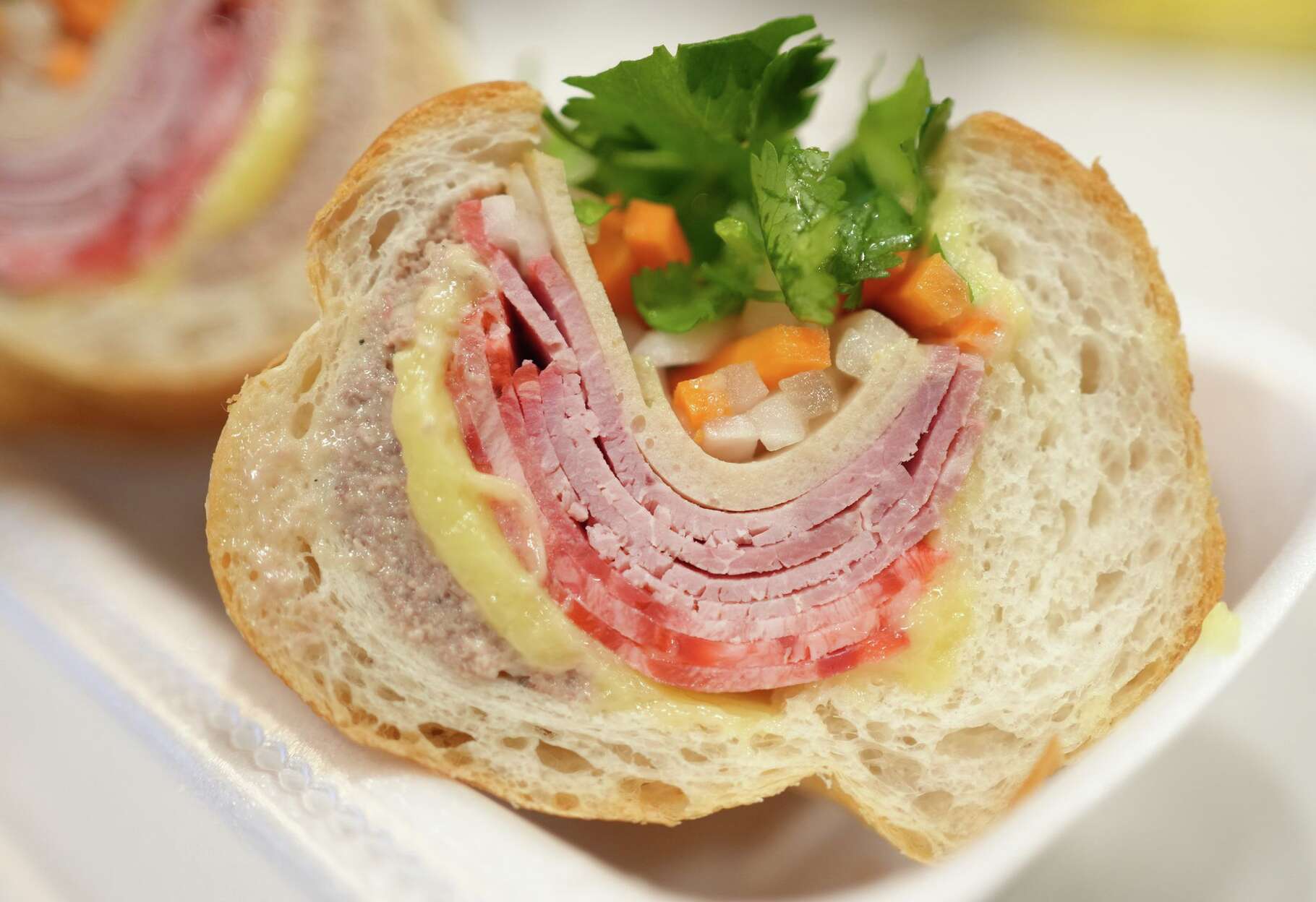 The combonation banh mi at Baguettea features butter and pate, photographed at the restaurant in Houston on Tuesday, Jan. 13, 2026.