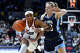 UConn guard Kelis Fisher, left, drives to the basket as Villanova guard Kelsey Joens, right, defends in the second half of an NCAA college basketball game, Thursday, Jan. 15, 2026, in Storrs, Conn. (AP Photo/Jessica Hill)