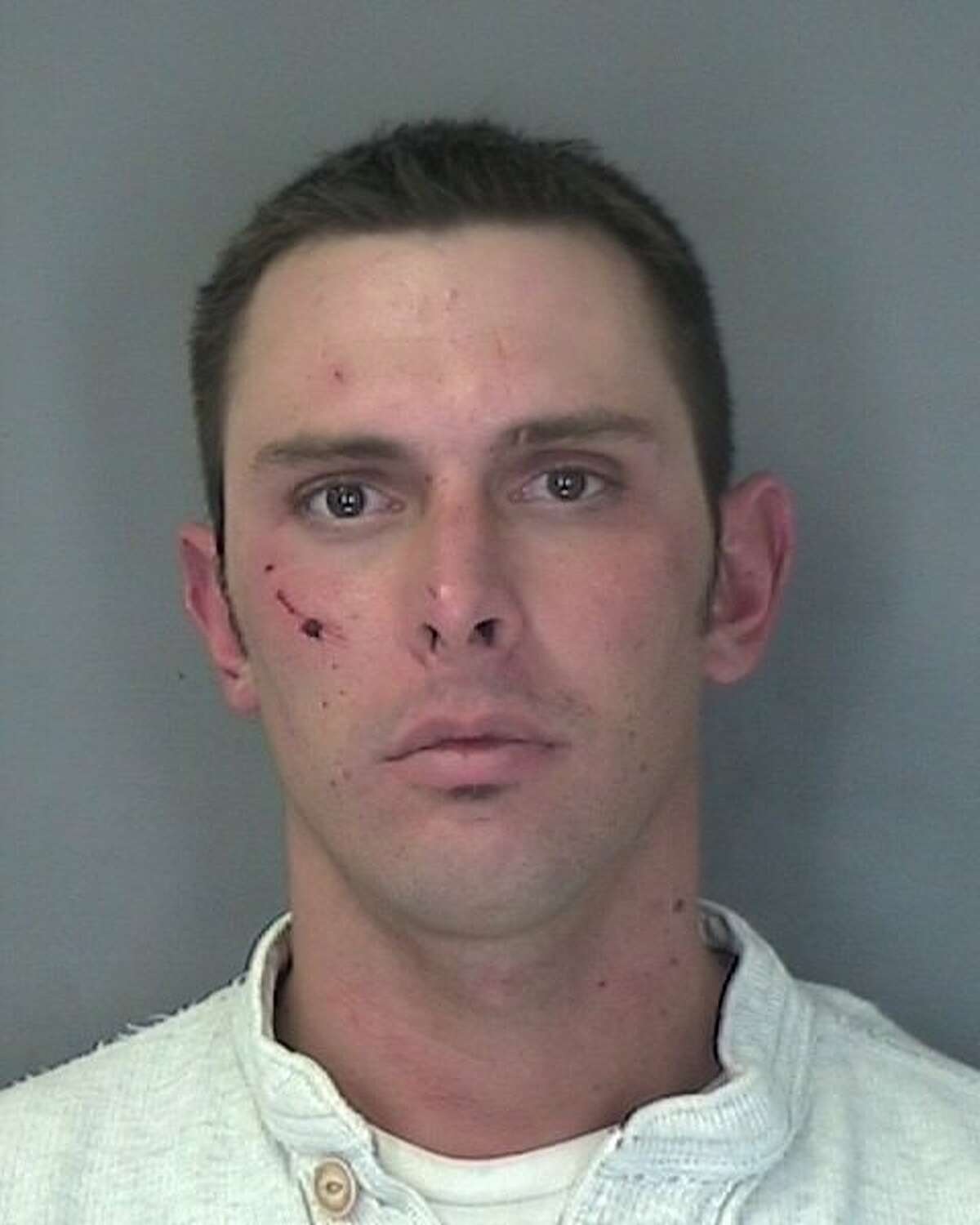 Man charged with choking woman