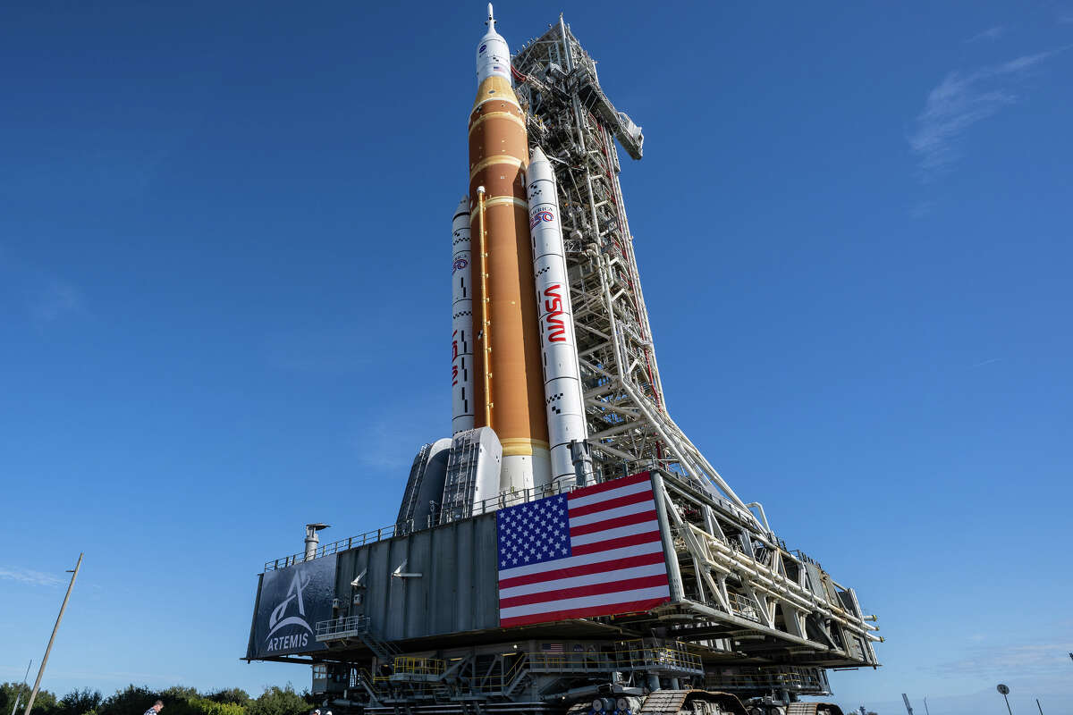 NASA's Artemis II Space Launch System rocket and Orion spacecraft, secured to the mobile launcher, are seen as they make the 4.2 mile journey toward Launch Pad 39B, Saturday, Jan. 17, 2026, at NASA's Kennedy Space Center in Florida. Photo Credit: (NASA/Keegan Barber)