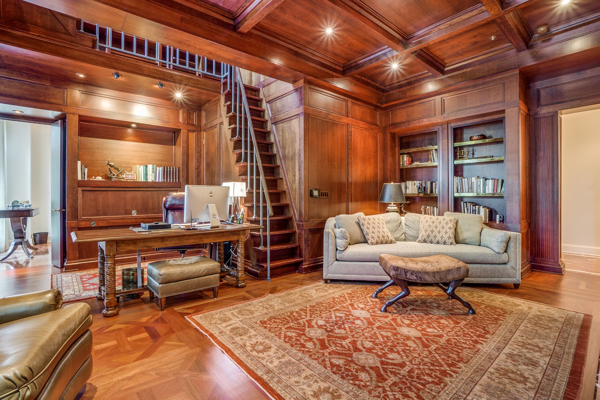 This Dallas condo has a view over the treetops and a wood-paneled ...