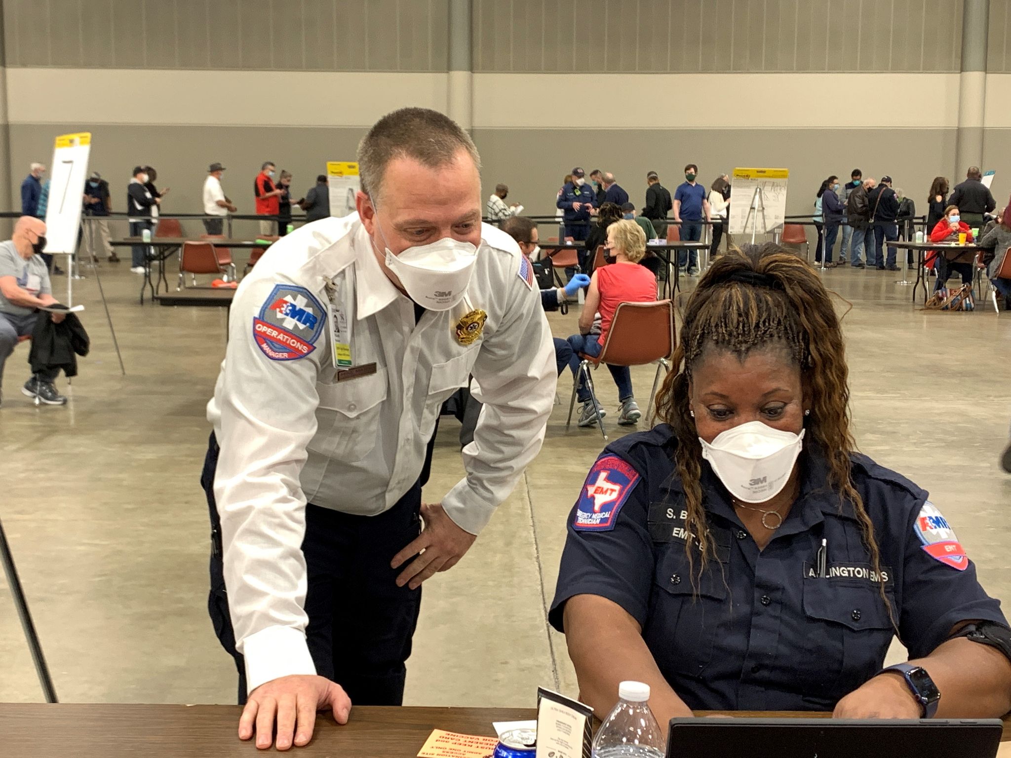 At an Arlington COVID-19 vaccination site, a first responder sees 'the ...