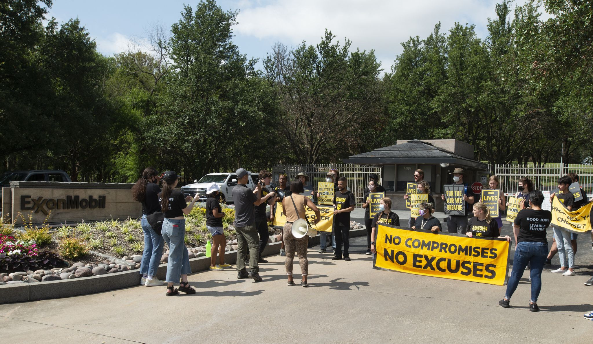 Young protesters outside Exxon headquarters demand legislation to curb ...