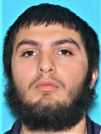 Woman arrested in Garland triple slaying, 2 suspects remain at large