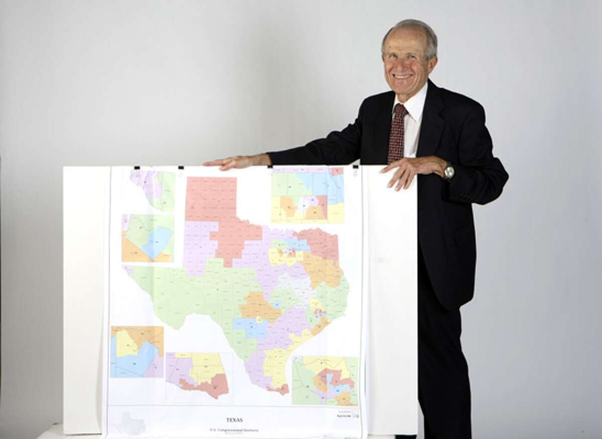 Bill Owens on Nov. 11 shows a redistricting plan he devised.