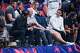 Luka Doncic (blue cap) sits courtside with members of the Mavs front office after Slovenia's game Thursday vs. Lithuania while waiting for Dirk Nowitkzi's jersey retirement at EuroBasket. From left are GM Nico Harrison, assistant GM Michael Finley, coach Jason Kidd, Doncic, governor Mark Cuban and director of player health and performance Casey Smith.
