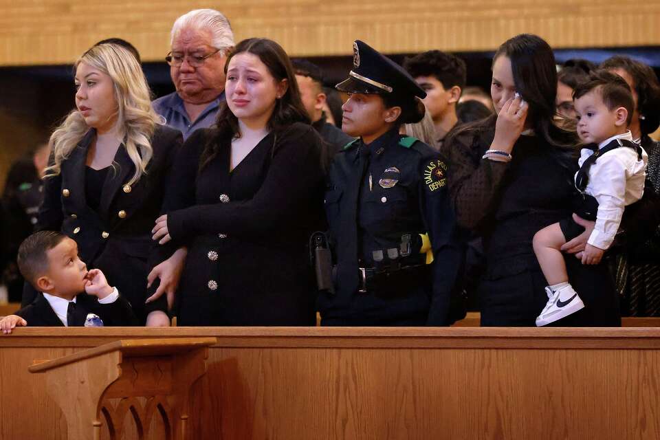 Dallas police officer killed in crash remembered as family man