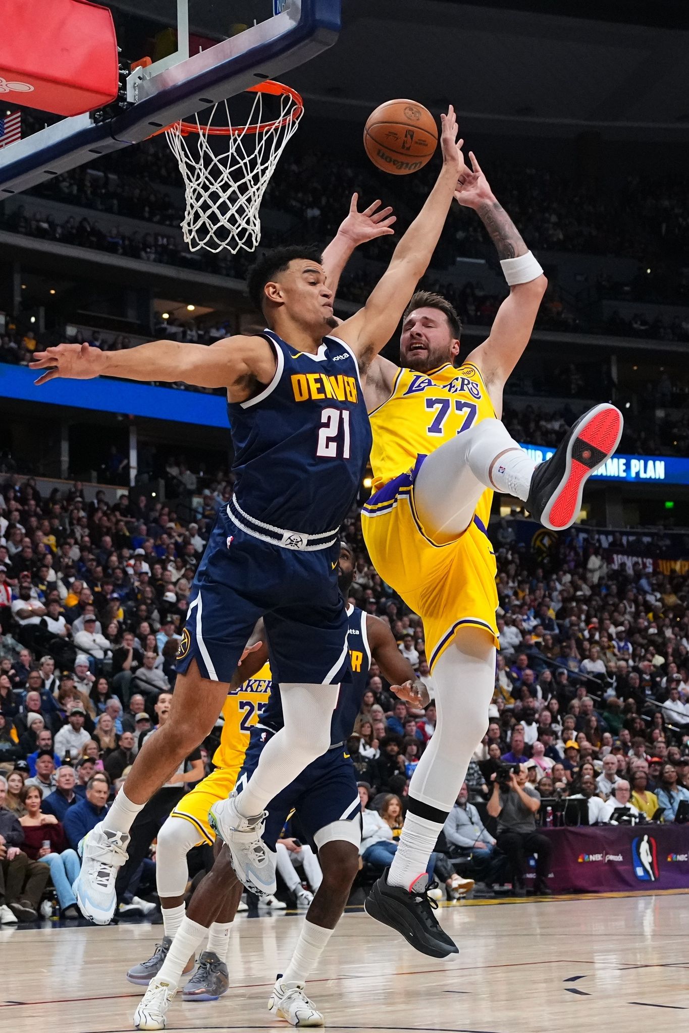 Doncic has a triple-double as the Lakers rally past the short-handed ...