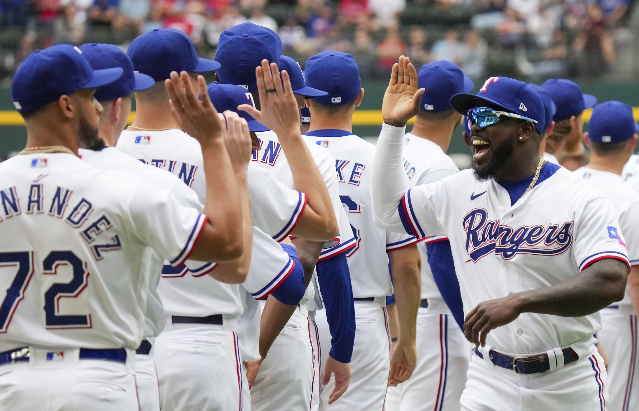 Rangers' family of Latino players brings passion to Texas clubhouse