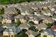 Aerial view of homes in the Harrington Mills subdivision on Saturday, April 8, 2023, in Plano.