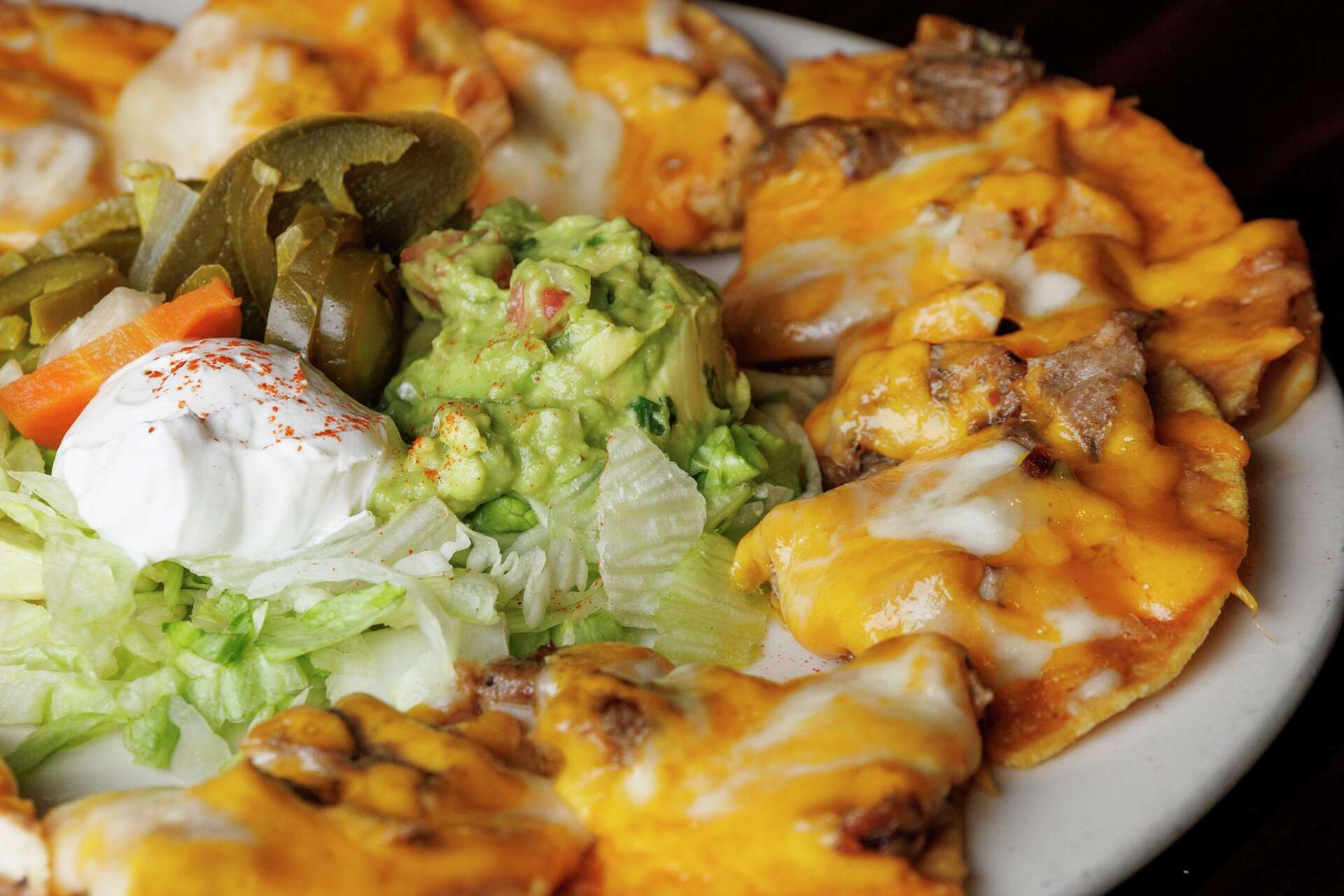 Nick Rallo Where to get classic Nachos Compuestos in Dallas