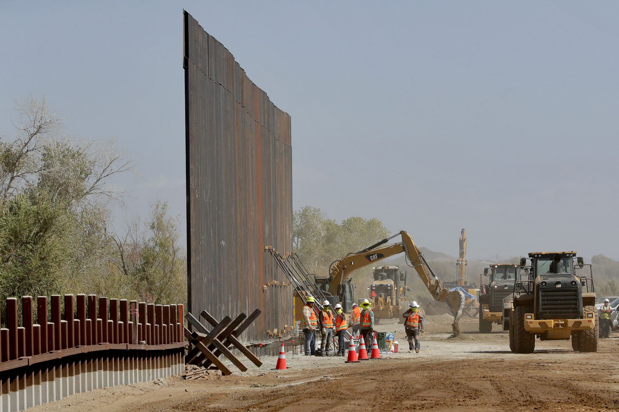 Biden expedites 20 miles of new border wall but thinks it won't work