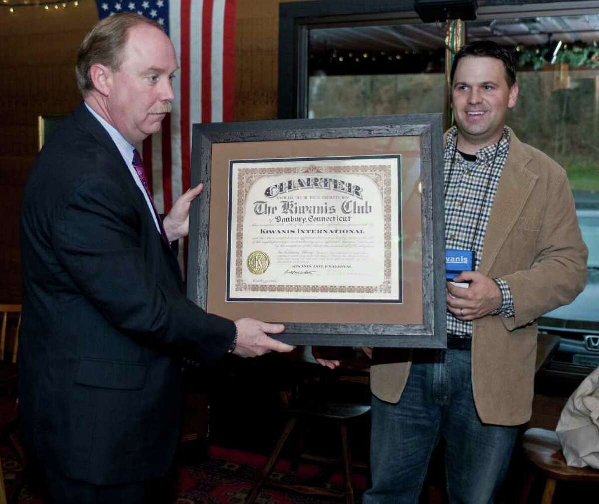 State Sen. Michael McLachlan and Kiwanis President Paul S. Caso with the original Kiwanis charter from Oct. 15, 1942. State Senator McLachlan presented it to club members following their weekly Tuesday luncheon at Chuck's Steak House. Tuesday, Nov. 30, 2010