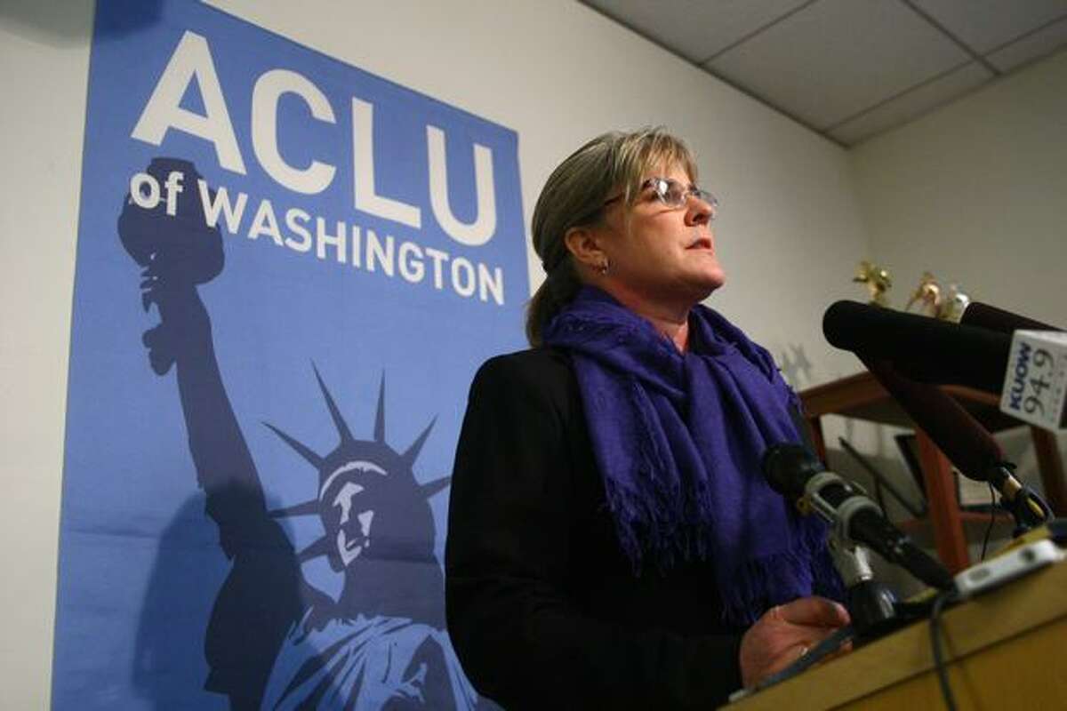 U.S. Air Force Maj. Margaret Witt, a flight nurse dismissed from the military after it was discovered that she was a lesbian, speaks during a press conference at the ACLU offices in Seattle.