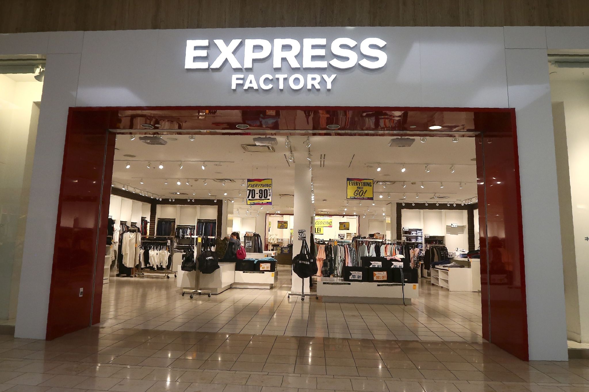 Express files for bankruptcy and will close more than 100 stores