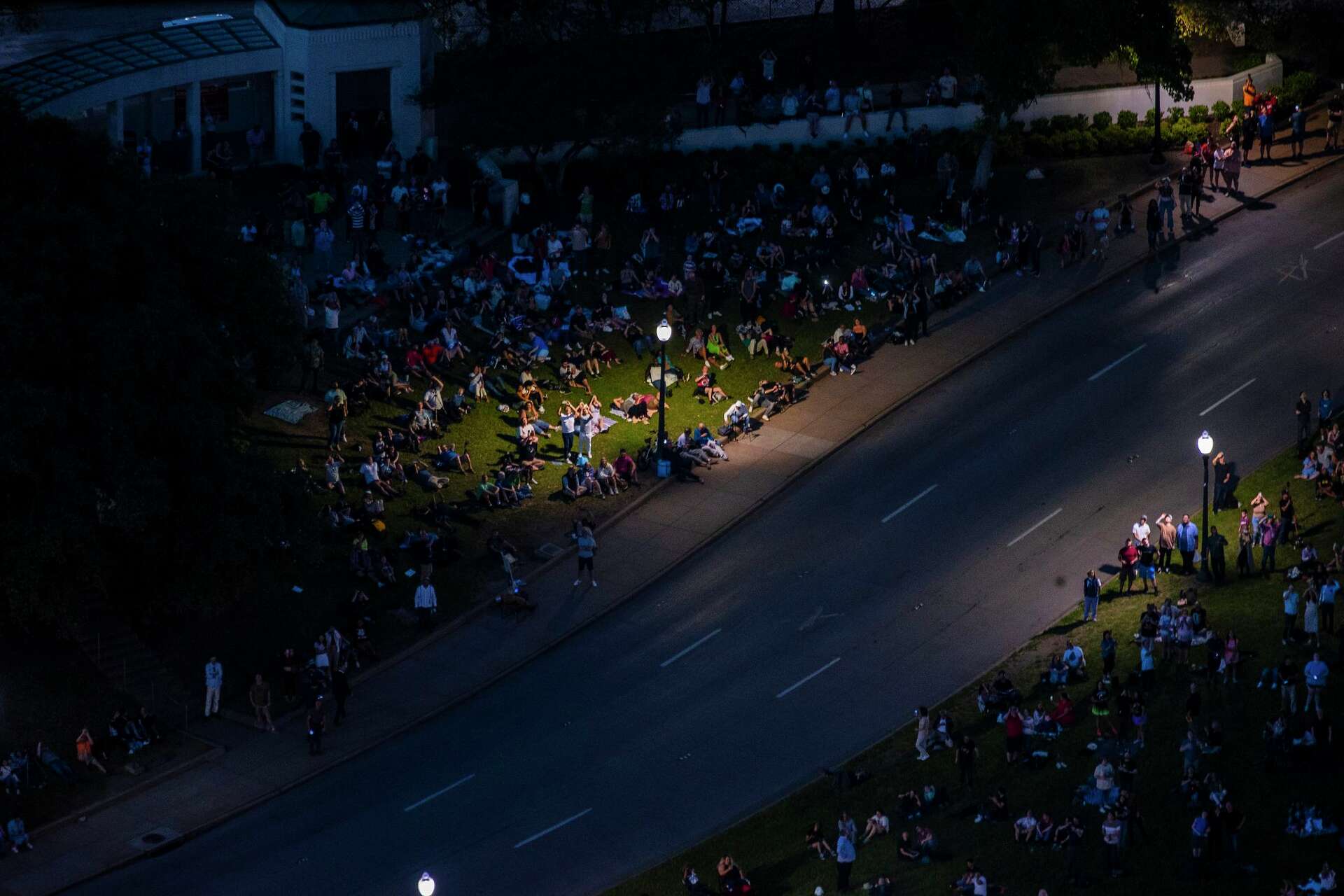 Total awe: Dallas basks in darkness of a rare solar eclipse
