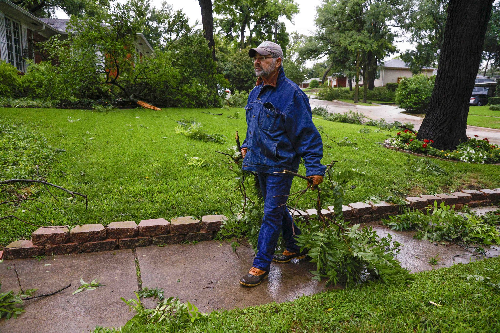 Storms pummel Dallas as hundreds of thousands lose power