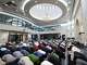 Members of the community hold a daily prayer at the East Plano Islamic Center in Plano. A reader enjoyed an open house at a local mosque.