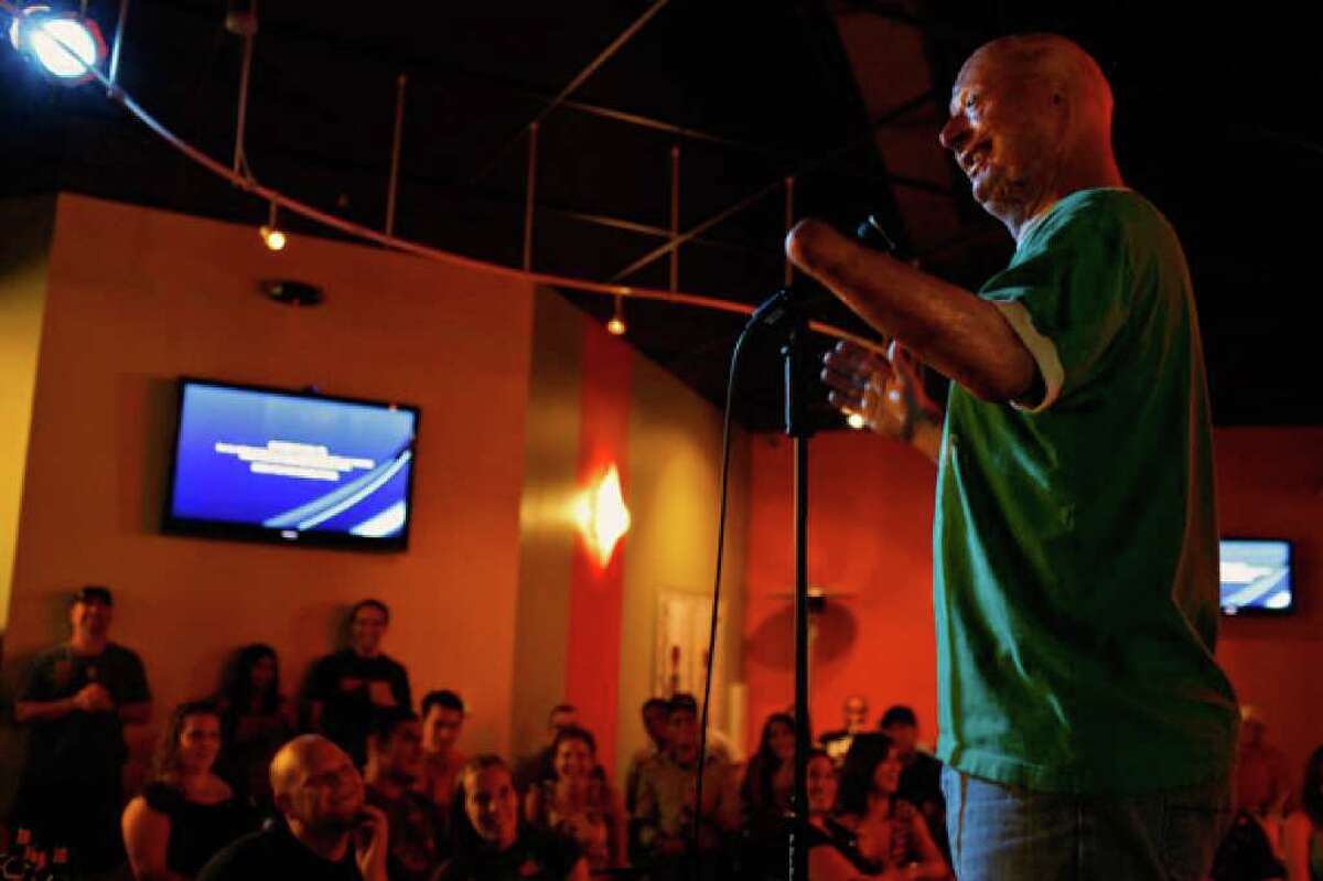 Army Staff Sgt. Bobby Henline entertains the audience during open-mike night at the Laugh Out Loud Comedy Club in San Antonio.