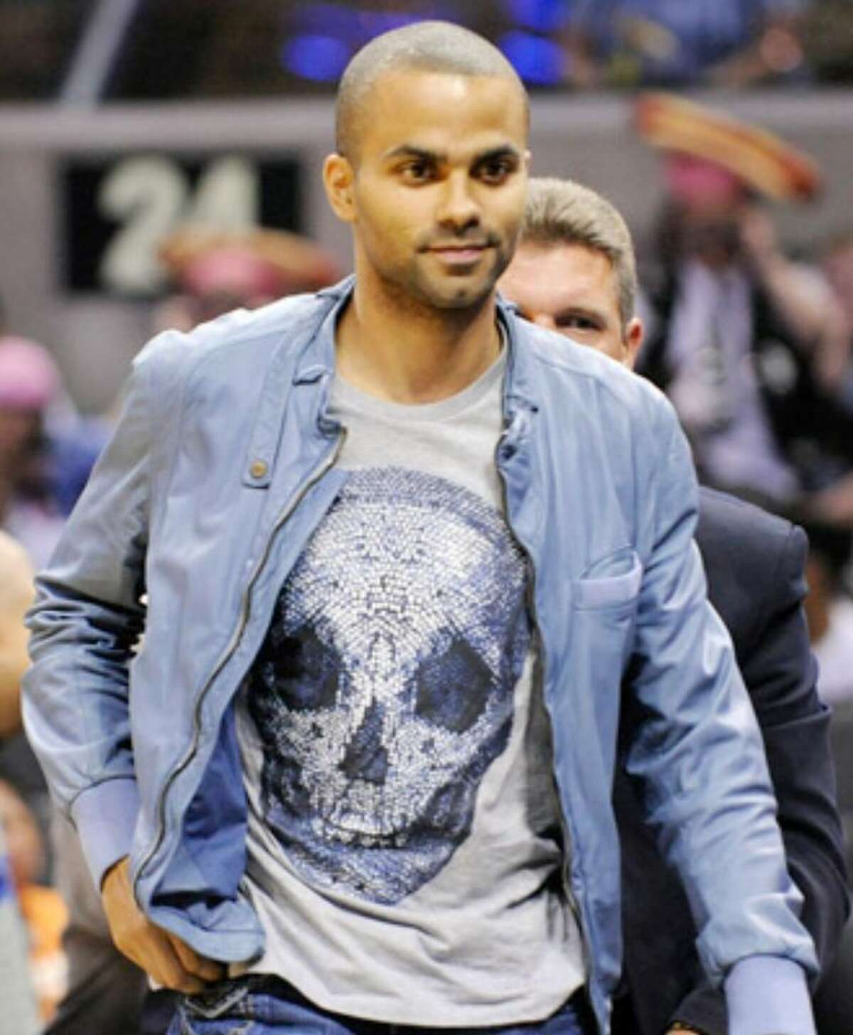 The Spurs' Tony Parker leaves near the end of the Silver Stars-Atlanta Dream WNBA game on May 15 at the AT&T Center. The Dream won 75-70.