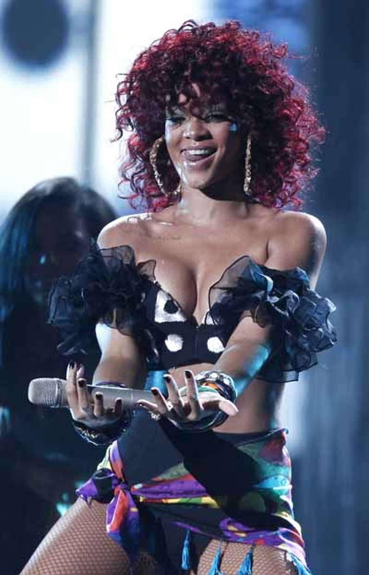 Watch the video: Rihanna's 'Man Down' Rihanna defends video, says victims need a voice NEW YORK (AP) -- Rihanna is defending her latest music video, which opens with a man being shot in the head. "Man Down," which premiered Tuesday on BET, is a song about a girl who shoots her abuser in public. The video also portrays sexual assault. On Tuesday, the Parents Television Council called the clip "disturbing" and asked BET to stop airing it. But on Thursday's "106 & Park," BET's music video countdown show, Rihanna said the video is "art with a message." "We just wanted to hone in on a very serious matter that people are afraid to address, especially if you've been victimized in this scenario," Rihanna said. BET says it will continue to play the video, explaining that the network "has a comprehensive set of standards and guidelines that are applied to all of our content" and that Rihanna's video "complied with these guidelines and was approved for air." MTV hasn't played the video. A MTV representative said they're "in the process of reviewing the video." Rihanna, who was attacked by then-boyfriend Chris Brown in February 2009, says she doesn't agree with violence. Brown attacked Rihanna on the eve of the Grammys two years ago. He pleaded guilty to a felony and was sentenced to five years' probation. "I've been abused in the past and you don't see me running around killing people in my spare time," she said. The "Man Down" clip was directed by Anthony Mandler, who has directed other Rihanna videos. (Read complete story)