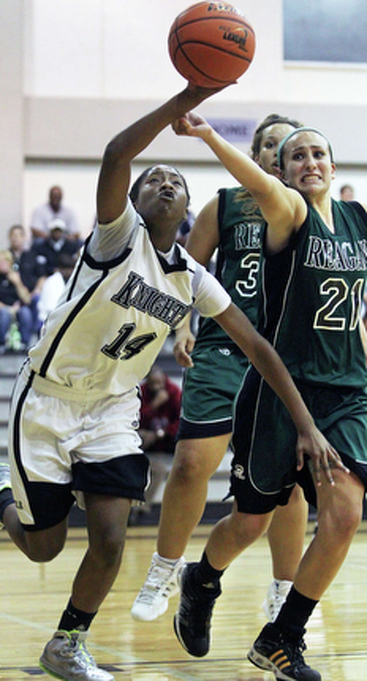 Steele's McKenzie Calvert wins the battle for possession of a loose ball against Marissa Rodriguez.
