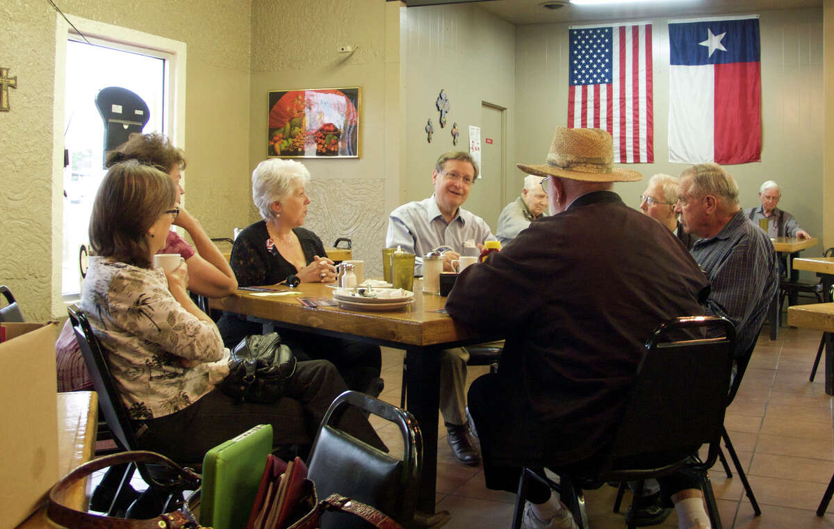Former U.S. Rep. Francisco "Quico" Canseco, R-San Antonio, chats with supporters in Uvalde's Sunrise Cafe on Monday, as Canseco starts a swing across rural southwest Texas in his campaign to regain District 23. He's in a May 27 GOP runoff with Will Hurd, with the winner facing U.S. Rep. Pete Gallego, D-Alpine, in November.