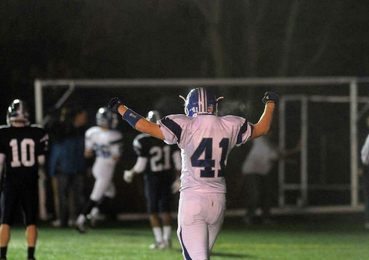 Darien's Jake Weil reacts to a touchdown as Darien High School faces Wethersfield in the football Class L State Quarterfinals in Wethersfield, Conn., Tuesday, November 30, 2010.