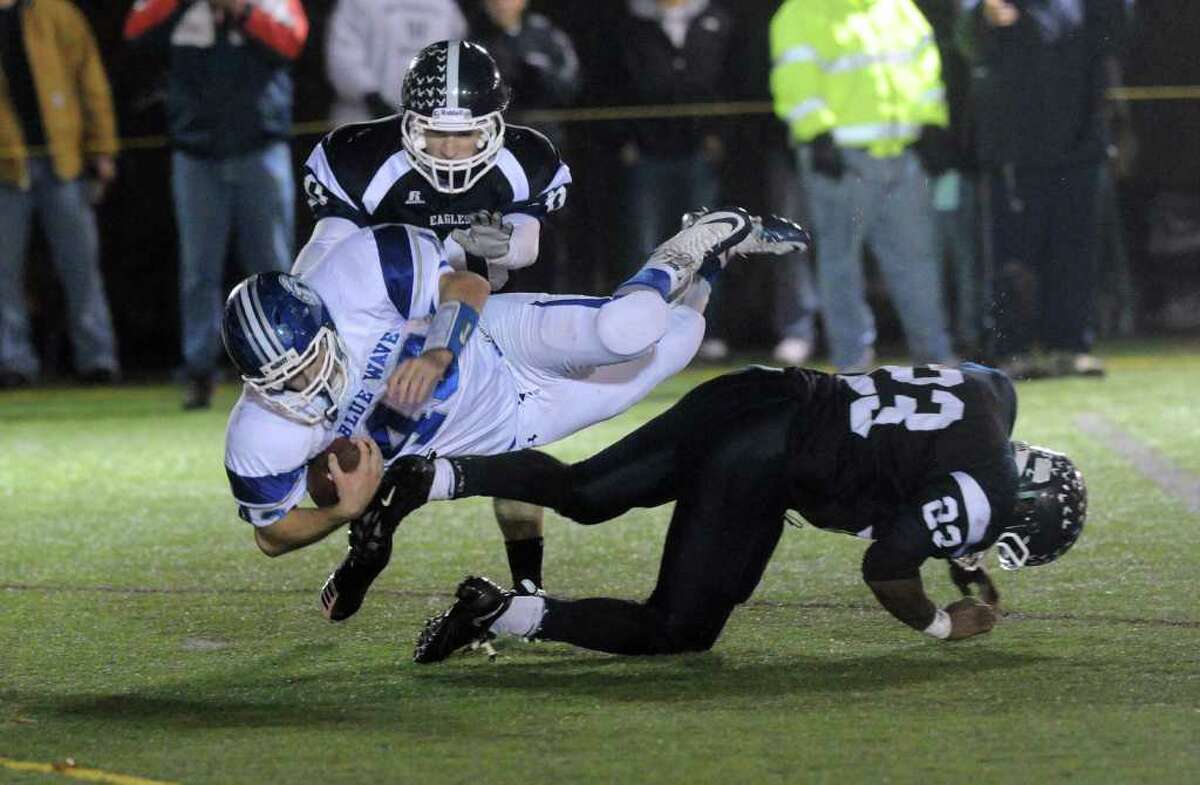 Darien's Brian Wiegand reaches for extra yards as Darien High School faces Wethersfield in the football Class L State Quarterfinals in Wethersfield, Conn., Tuesday, November 30, 2010.