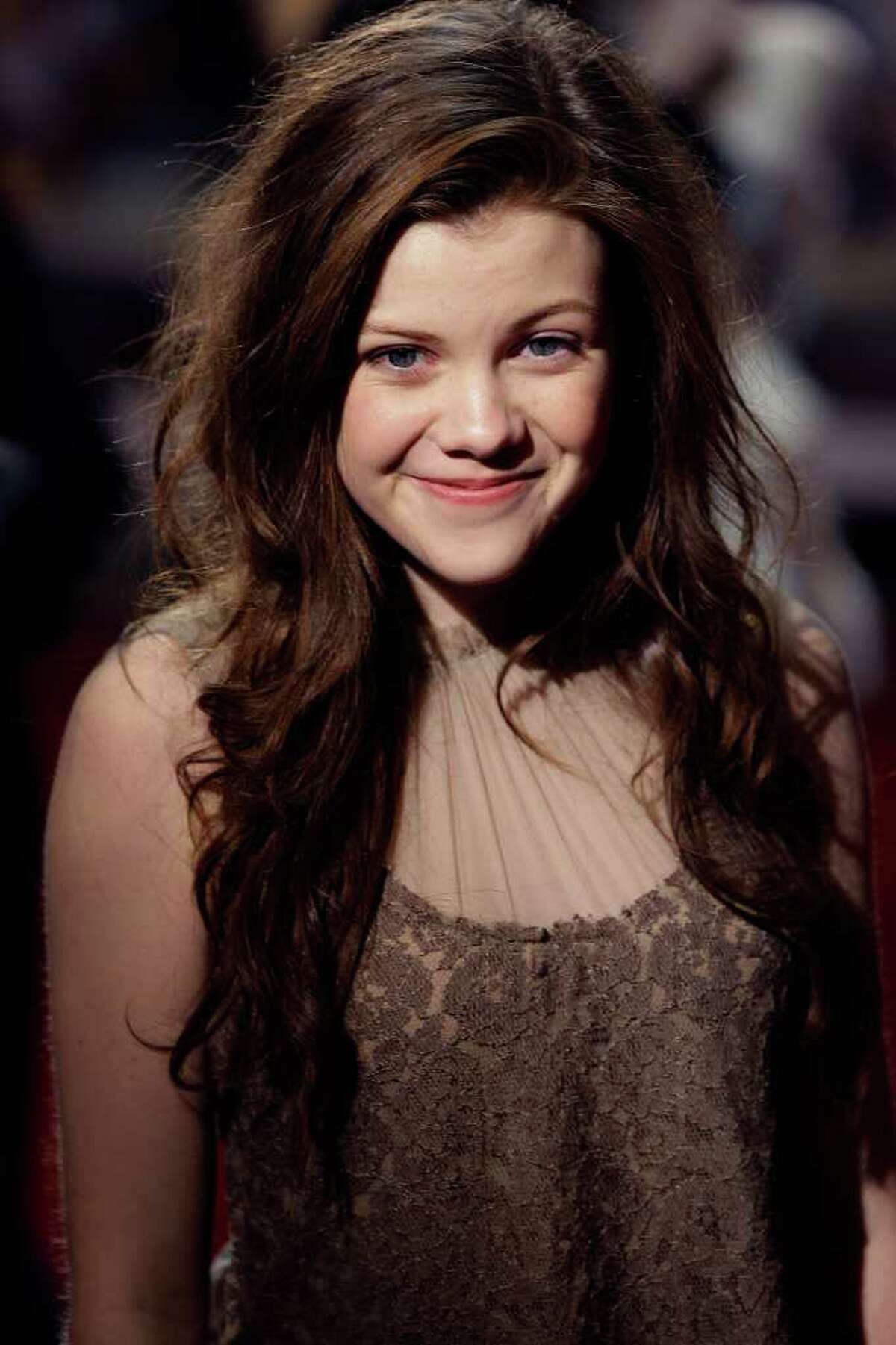 British actress Georgie Henley arrives for the World premiere of 'The Chronicles of Narnia: Voyage of the Dawn Treader', at a cinema in Leicester Square, London, Tuesday, Nov. 30, 2010. (AP Photo/Joel Ryan)