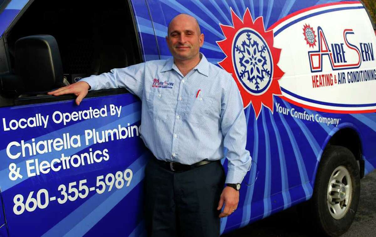 SPECTRUM/Michael Chiarella and his wife, Rusty, not shown, are the co-owners of Aire Serv of Western Connecticut in New Milford. The company provides air conditioning and heating services. For Greater New Milford Chamber of Commerce Business Quarterly for December 2010.