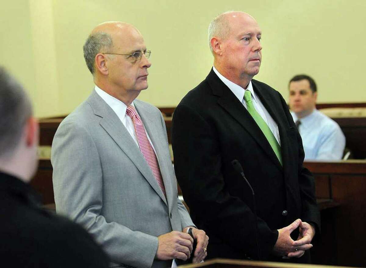 Former Albany Detective George McNally, right, is arraigned in Abany County Court 19 months ago on reckless driving and driving while intoxicated. At left is his attorney Stephen Coffey. McNally pleaded guilty. McNally has endorsed the embattled Albany Police Officers Union in a letter to members.(Times Union archive)