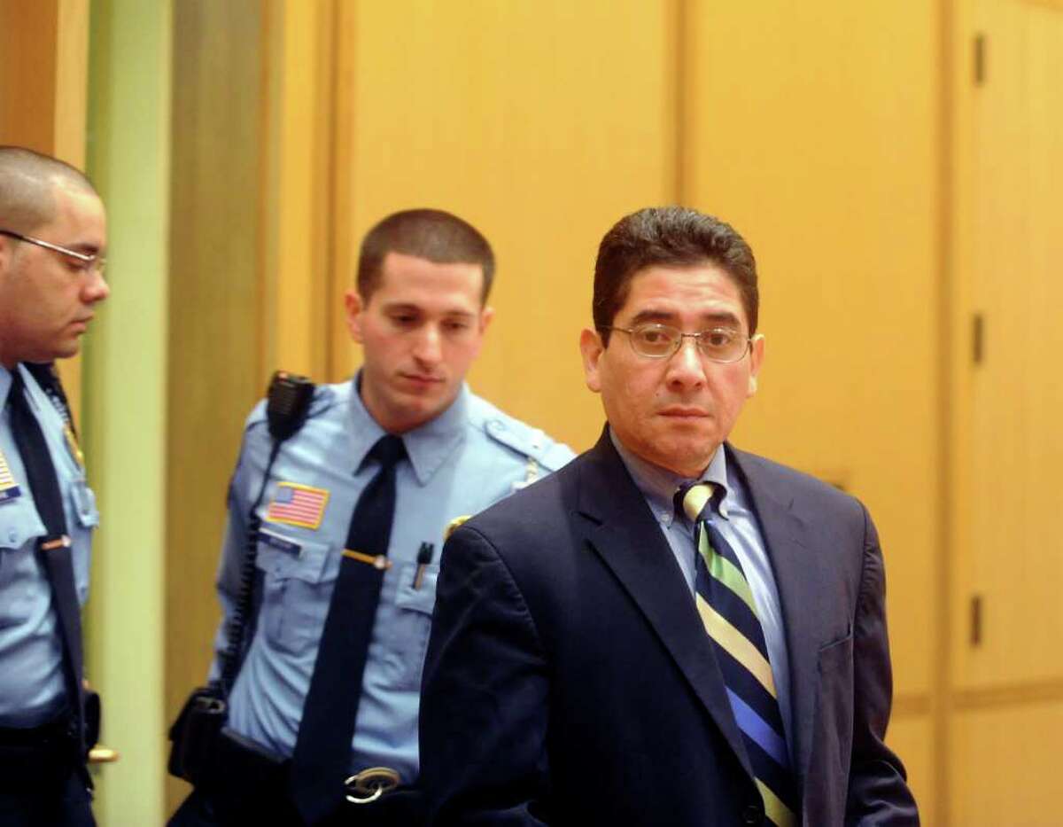 Defendant Carlos Trujillo enters state Superior Court in Stamford for the second day of his murder trial Wednesday, Dec. 1, 2010. Trujillo is accused of killing Anderson Kissel, of Greenwich.