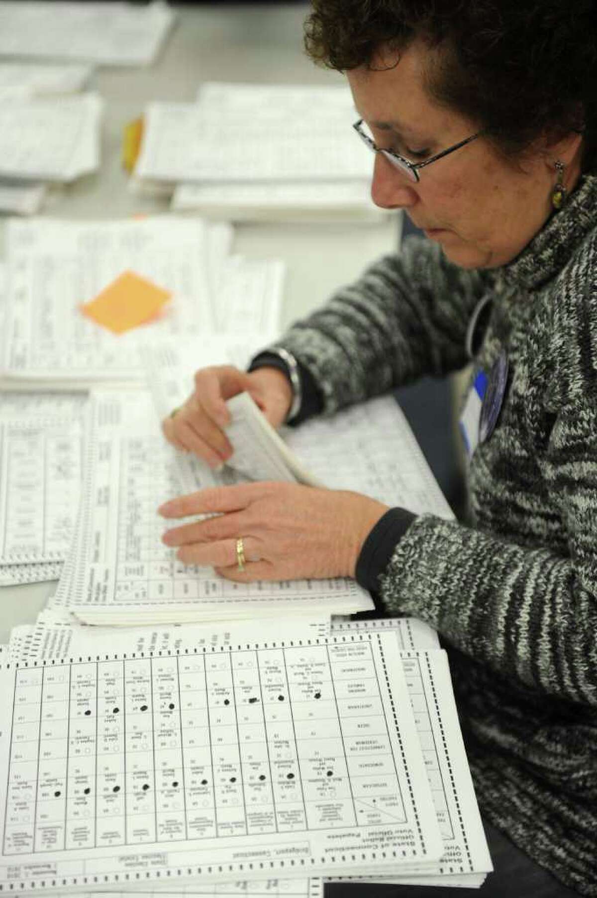 Yvonne Senturia helps re-count ballots at the City Hall Annex on Thursday, November 2, 2010.