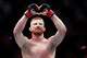 Bo Nickal reacts after defeating Scotland's Paul Craig in a UFC 309 mixed martial arts middleweight title bout, Saturday, Nov. 16, 2024, in New York. (AP Photo/Adam Hunger)
