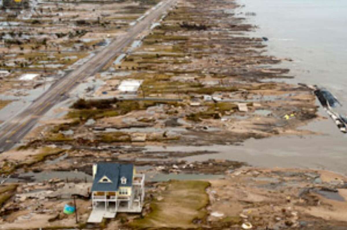 THEN: Hurricane Ike left few structures standing in the Bolivar Peninsula community of Gilchrist.