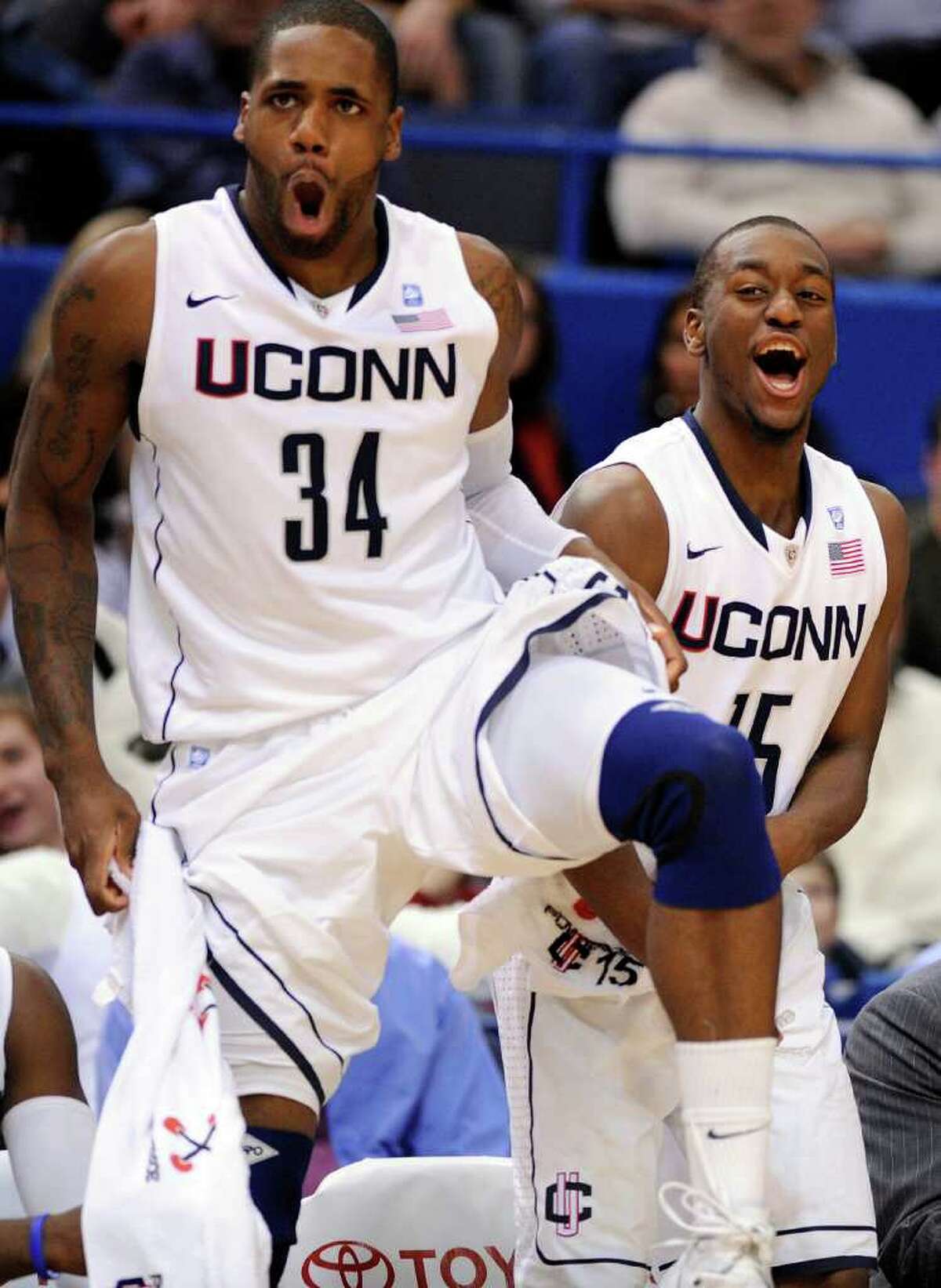 Walker's triple-double paces UConn rout