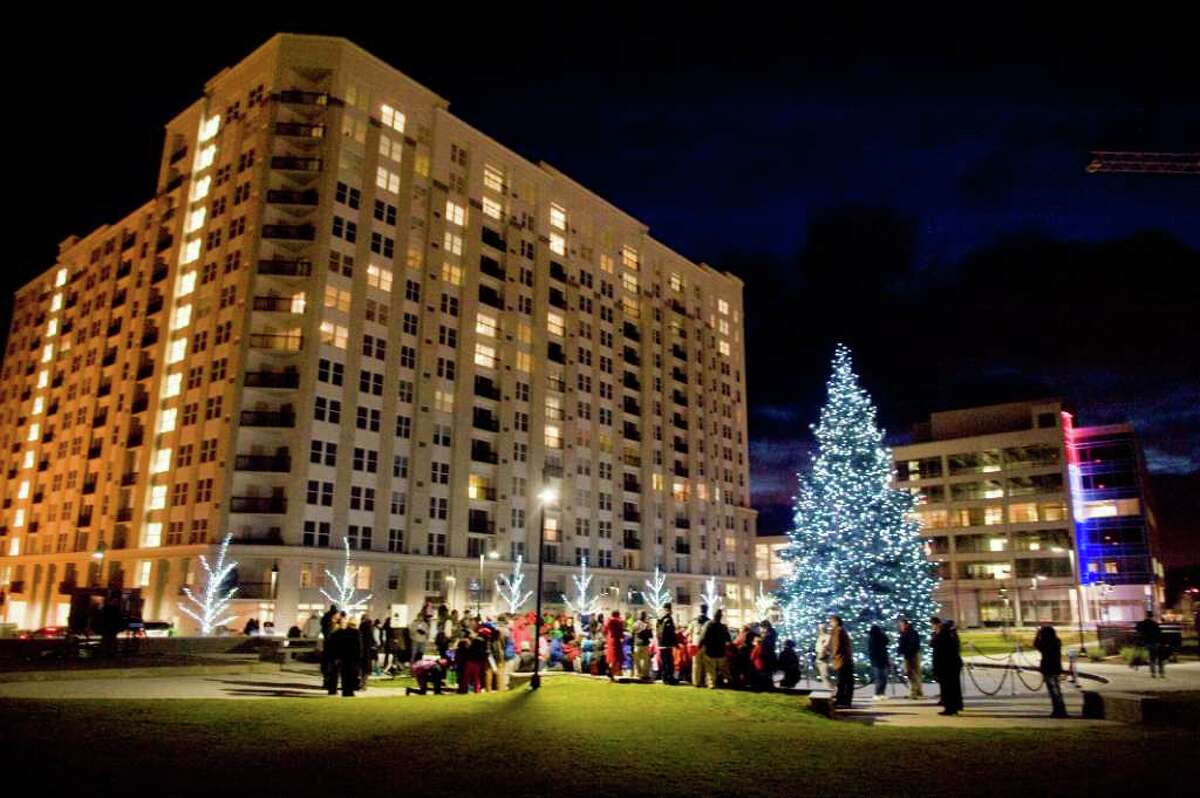 A tree lights Commons Park for the first time as Building and Land Technology, the developer of Harbor Point, hosts the event in Stamford, Conn., Monday, December 6, 2010.
