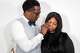 Andrew Anthony, the father of Karmelo Anthony, a 17-year-old who has been charged with first-degree murder in the fatal stabbing of fellow 17-year-old Austin Metcalf at a Frisco track meet, wipes the tears of his wife Kala Hayes after she spoke at a press conference, Thursday, April 17, 2025, at a co-working space in Dallas, Texas.