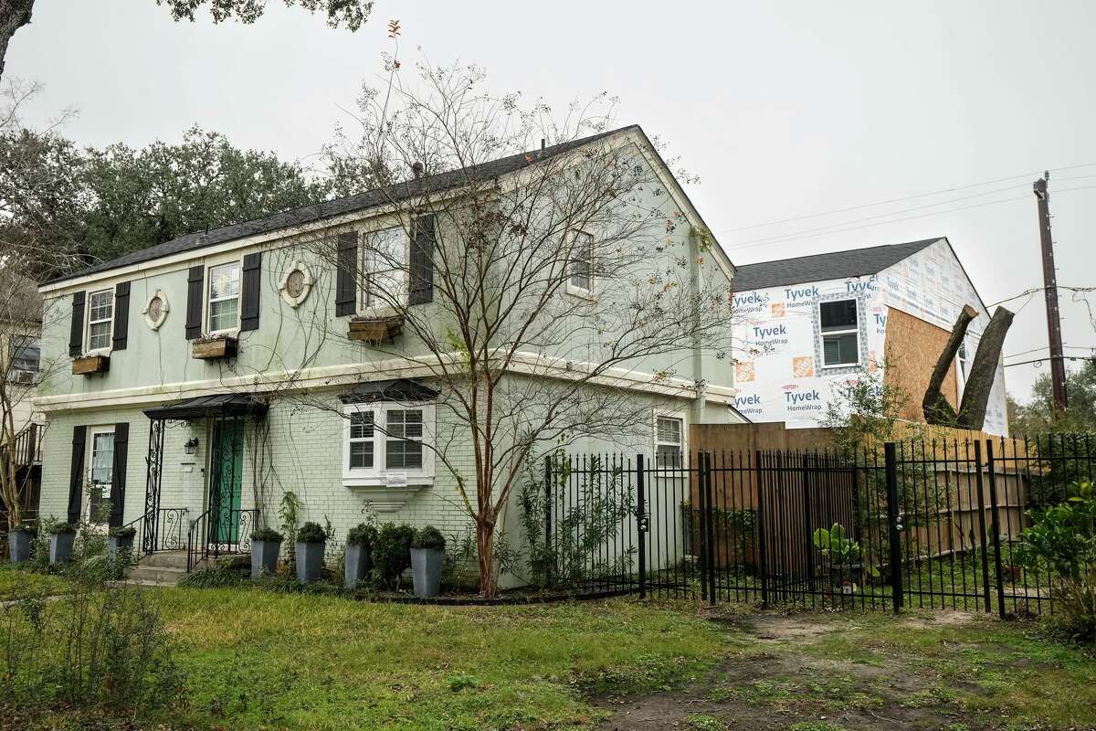New construction is shown being built behind a 3rd Ward home in Houston, Thursday, Jan. 22, 2026. Marc Newsome and his neighbors are taking on a company that has blatantly ignored the City of Houston's orders to stop construction. The same developer has properties scattered throughout Third Ward, and residents say the problems go far beyond missing permits. They claim the construction violates long-standing deed restrictions, sidesteps city oversight and threatens the character of their community.
