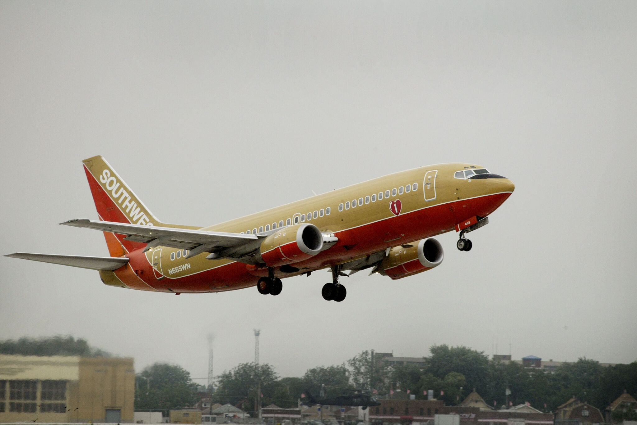 chron.com - Gwen Howerton - Southwest Airlines christens death of long-standing policy with retro plane